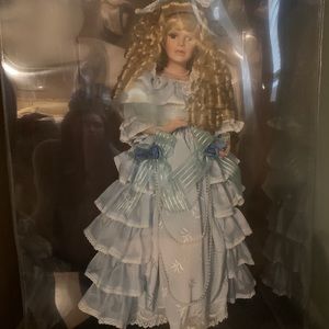 Blue collectable porcelain doll